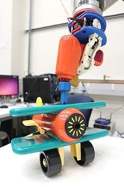 Sure, your robot can pour from a pitcher, but how large and heavy is it? Does it have a lid? What material is it made from? (Image courtesy of Yale.)