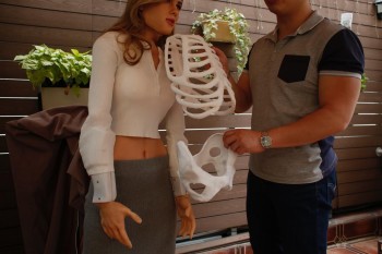 Ma shows off the 3D Printed skeletal structure of the Mark 1.