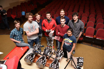 The University of Oklahoma’s Sooner Rover Team, with rover “Rovie McRoverface.” L to R: Nathan Justus, Brent Wolf, Dane Schoelen, Bill Doyle. Above: Alex Borgerding, Jacob Jordan, Janella Clary, Kevin Cotrone. (Image courtesy of Jawanza/University of Oklahoma.)