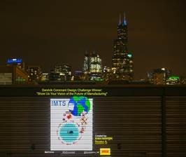 Original artwork created by student Erika Flickinger is projected onto the Chicago skyline as part of a special light display promoting STEM education and the future of manufacturing during the IMTS Show. (Image courtesy of Sandvik Coromant.)