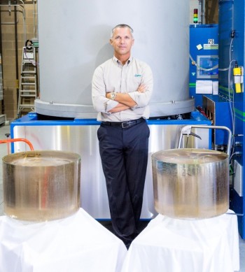Dr. Schwerdtfeger with 300 kg sapphire boules repeated in CHES 500. (PRNewsFoto/Advanced RenewableEnergy Co. LLC)