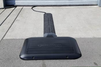 Formula E cars already use high-tech methods for their electric engines, including wireless induction chargers like this one for refueling. The hope for Roborace is to inspire similar breakthroughs for driverless tech. (Image courtesy of Formula E.)