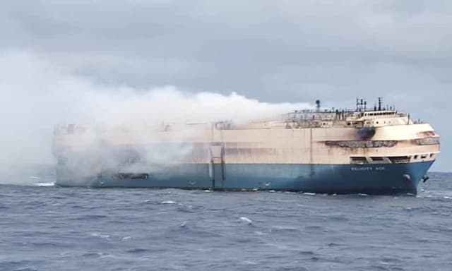 After smoldering for two weeks, the Felicity Ace finally sank. The cargo included luxury cars. That’s not why we should care. (Picture courtesy of Portuguese Navy.)