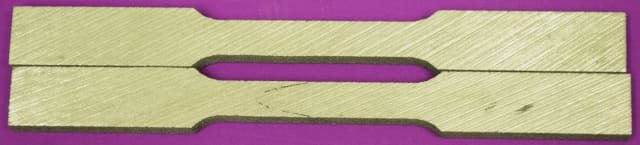 This is an example of how researchers at NYU Tandon School of Engineering can embed flaws in 3-D printed objects so that only trusted parties can print the part correctly. The top bar, which was printed under the right processing conditions, does not contain an embedded surface and has high quality. The bottom bar shows the embedded surface and will have lower quality and breaks easily at the discontinuity. (Image courtesy of Nikhil Gupta.)