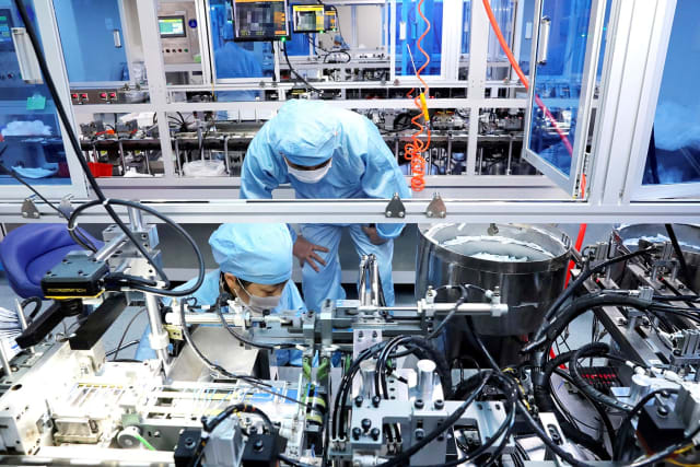 Pictured here are workers on the production line manufacturing COVID-19 testing kits in a biopharmaceutical company in Nantong, China in March. Many of the world’s critical medical supplies are manufactured by China and the United States. Since the COVID-19 pandemic, the global medical supply chain has been turned upside-down, affecting the ability of many nations to procure critical medical products to treat their local outbreaks of COVID-19. (Image courtesy of FeatureChina via AP Images.)