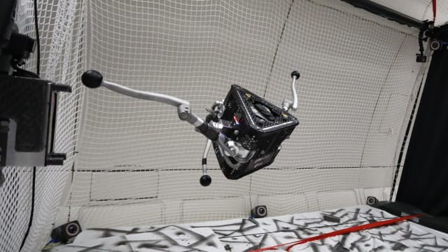 Testing SpaceHopper on a parabolic flight to simulate weightlessness. (Image: ETH Zürich.)