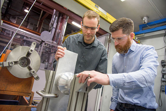Preparing a prototype part for an electric motor in the NRC’s cold spray facility. (Image courtesy of NRC.)