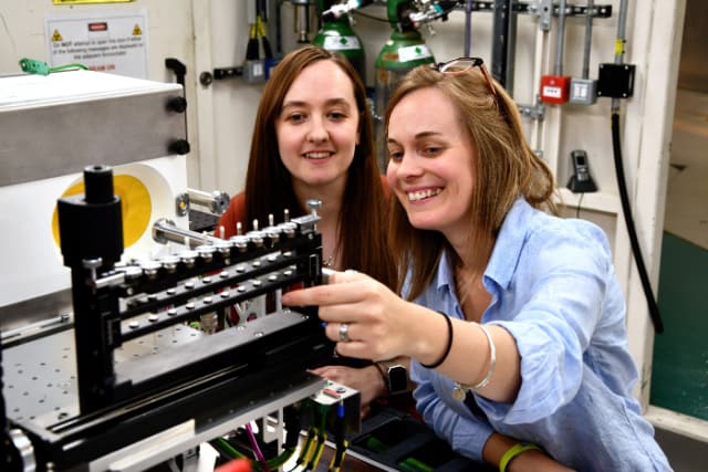 Sarah Day, Senior Support Scientist on I11 with Claire Corkhill, Principal Investigator. (Image courtesy of Diamond Light Source.)