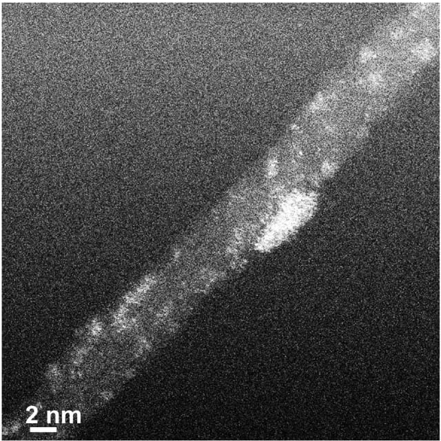 TEM (tunneling electron microscope) image of a carbon nanotube decorated with platinum clusters (bright color). (Image courtesy of Aalto University.)