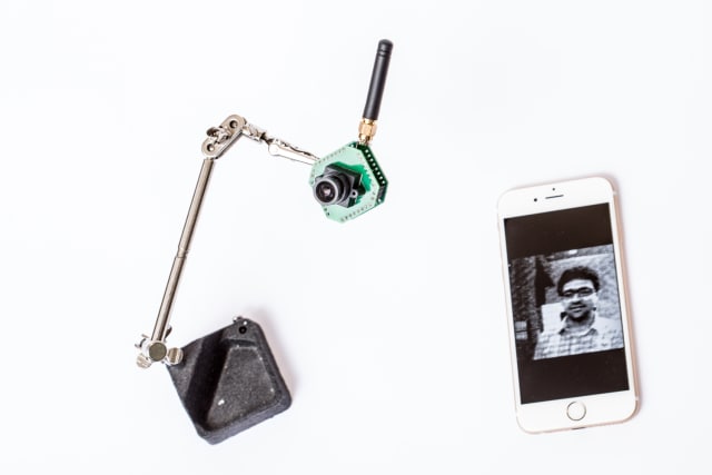 The UW team also created a low-resolution, low-power security camera, shown here on a stand. It can stream at 13 frames per second to another device, such as a smartphone. (Dennis Wise/University of Washington.)