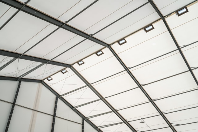 Legacy fabric buildings allow natural light to shine through, and can accommodate passive ventilation systems, skylights and solar panels. (Image courtesy of Legacy Building Solutions.)