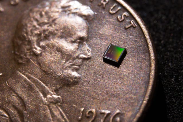 The temperature sensor is integrated into a small chip measuring 0.15 × 0.15 square millimeters in area. (Image courtesy of David Baillot/UC San Diego Jacobs School of Engineering.)