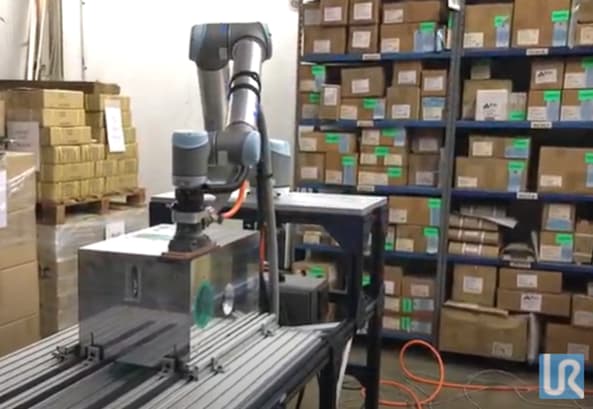 A Universal Robot in place at All Axis Machining. (Image courtesy of All Axis Machining.)