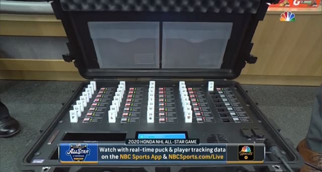 The player tags in their charging station pre-game. (Image courtesy of SMT.)