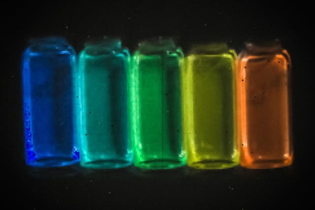 Researchers have found a way to make tiny particles that can be injected into the body, where they emit short-wave infrared light. The advance may open up a new way of making detailed images of internal body structures such as fine networks of blood vessels. (Image courtesy of Bawendi Group/MIT.)