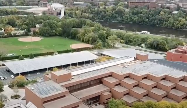 Rooftop photovoltaics and a solar carport. (Image courtesy of the University of Minnesota.)