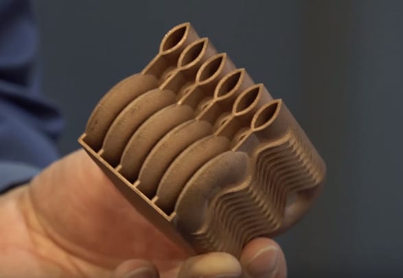 A copper heat exchanger produced by Stratasys Direct.