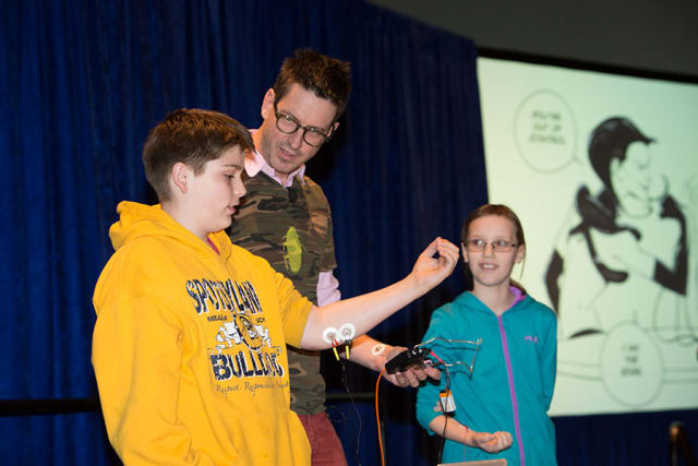 Neuroscientist Greg Gage from Backyard Brains leads a demonstration on neuroscience. (Image courtesy of USA Science and Engineering Festival.)