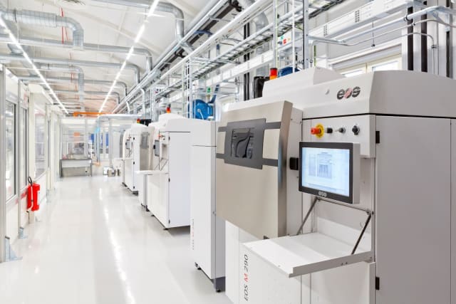 Mass production of metal AM parts requires no special construction or support services for existing factories. (Image courtesy of EOS.)