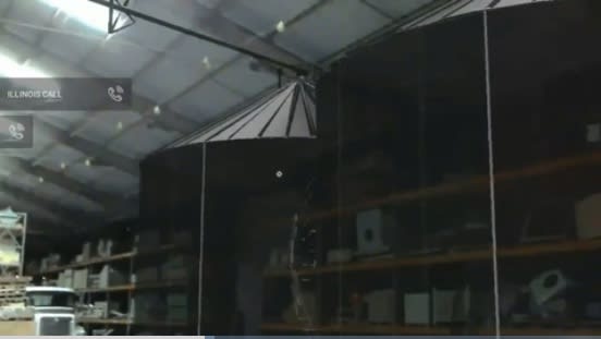 Using PTC Vuforia, AgCo was able to build a product visualization experience from their existing CAD models in augmented reality for Microsoft HoloLens, allowing their dealer network to present a dynamic product visualization of AgCo’s grain storage system at a 1:1 scale superimposed in the customer’s intended location. (Image courtesy of PTC.)