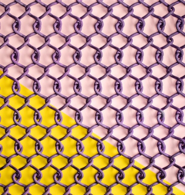 A chain-link design that is printed as a single twisted unit and can compress and expand. The print has been dyed purple. (Image courtesy of HP.)