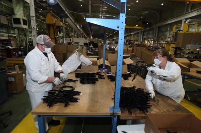 Instead of automotive plastic parts, a new production line with the capacity to produce 3,000 face shields per hour has been set up. (Image courtesy of Honda.)