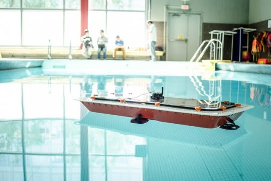 A scaled-down model of the team’s self-guided boat. (Image courtesy of MIT.)