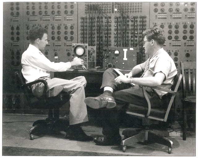 MacNeal (right) and Schwendler (left) working on the space program.