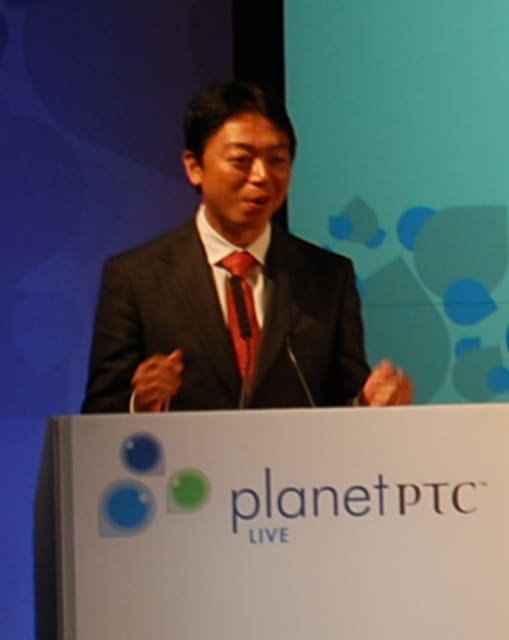 Hiroaki Kuwahara, president of PTC Japan, welcomes attendees to PlanetPTC Live in this 2010 photo. (Image courtesy of PTC.)