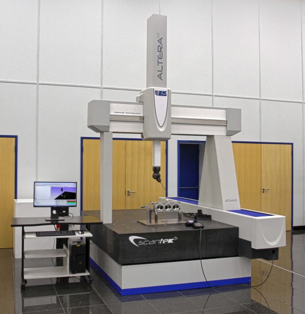 Above, the SCANtek 5 recently introduced by LK Metrology. The component being measured by the machine has a complex surface area with many grooves and holes.