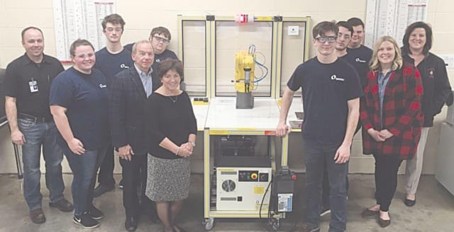 HCTC Machine Tool students gather with representatives from the Henry A. Jubel Foundation after showcasing their robot programming skills. (Image courtesy of HCTC.)