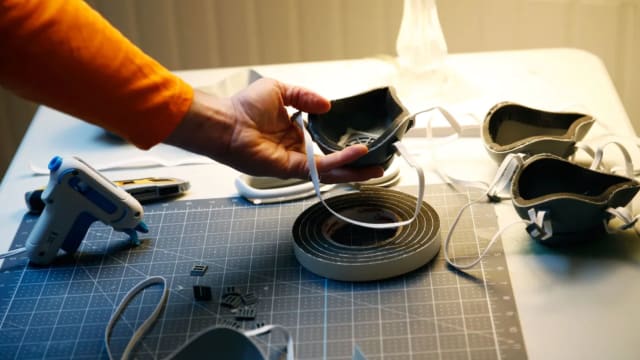 From hobbyists to big companies, people are providing innovative solutions to address the shortage of medical supplies via DIY hacks to using personal 3D printers, like Boston-area high school teacher Bennett Ahearn, to make masks. (Image courtesy of Jessica Rinaldi/The Boston Globe via Getty Images.)