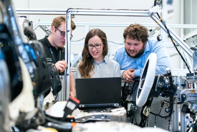In the workforce, engineers work in collaborative team environments that educators hope to better replicate in the classroom. (Stock image, Unsplash.)