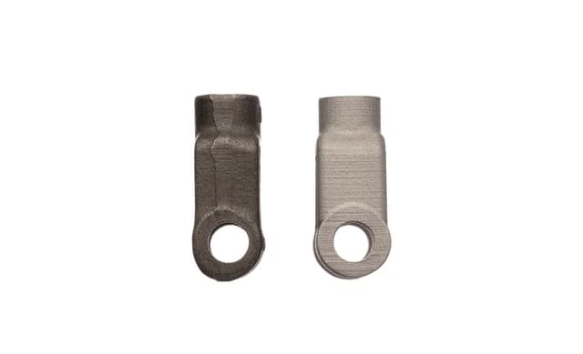 (Right) A yoke for a brake assembly produced with the DM Studio System as a replacement part for heavy machinery. (Left) The original part that was cast and machined. (Image courtesy of Desktop Metal.)