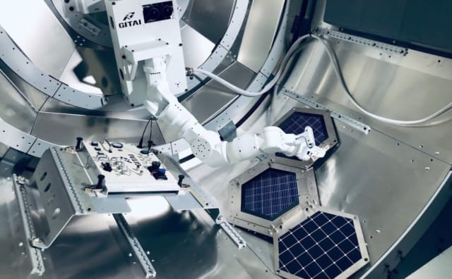 A GITAI robot performs work during a ground experiment inside the Nanoracks Bishop airlock. (Image courtesy of GITAI.)