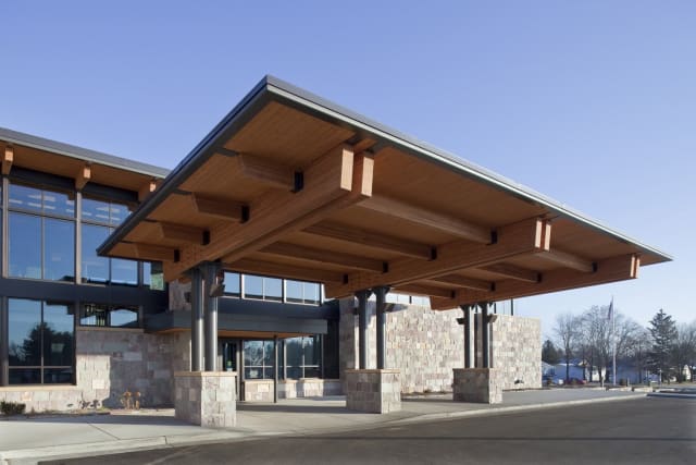 Looks like the real thing because it mostly is. Mass wood, an engineered structural material, can pass for normal wood—at a distance. (Image courtesy of HGA.)