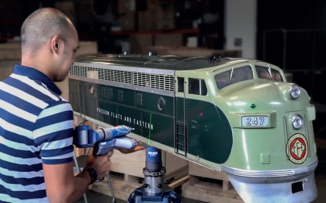 A large model train sits atop the rotary stage to make scanning the complete object much easier for the user. (Image courtesy of FARO.)