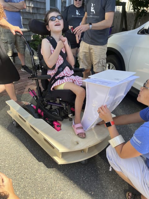 Savannah gets fitted for a custom wheelchair by a team led by Magic Wheelchair and Dassault Systèmes SOLIDWORKS. (Picture courtesy of Dassault Systèmes.)