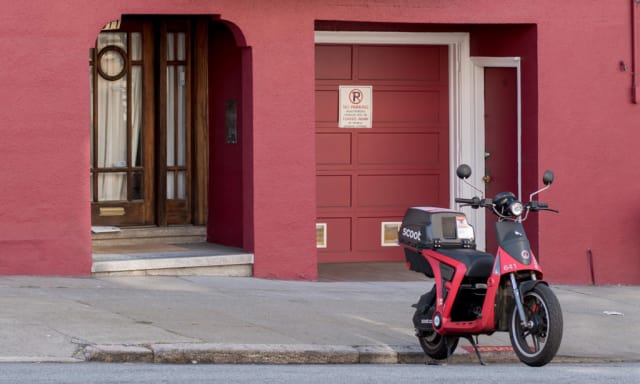 Just waiting for a rider. See a Scoot in San Francisco and you can ride it across town for as little as $3. It is turned on with an app. When you get to your destination, just leave it there for the next person. Really, who needs to buy a scooter when you can do this? (Picture courtesy of Scoot Networks)