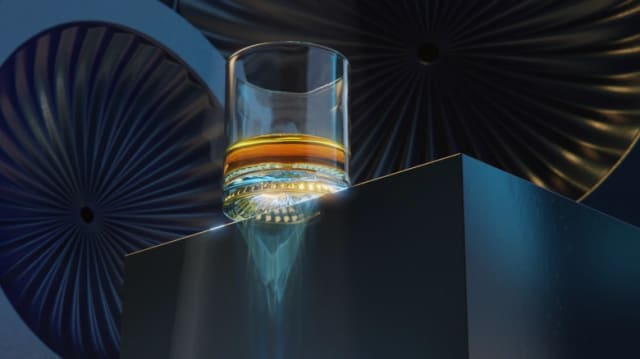 Before the fall. Caustics cause a refraction pattern under a glass of whiskey. (Picture by David Merz, courtesy of KeyShot.)