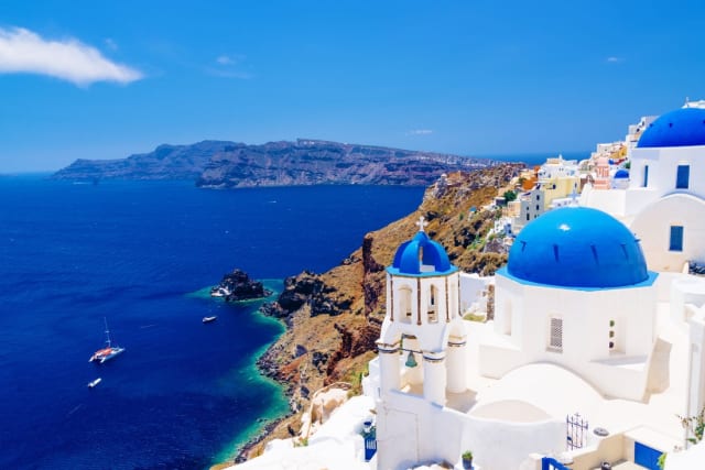 A vacation that inspired. The island of Santorini, Greece. (Picture courtesy of Wikipedia.)