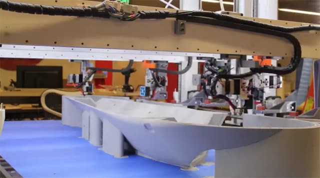 Cronus uses five gantries to 3D print objects at 4 to 5 times the speed of traditional thermoplastic extrusion systems. (Image courtesy of Titan Robotics.)