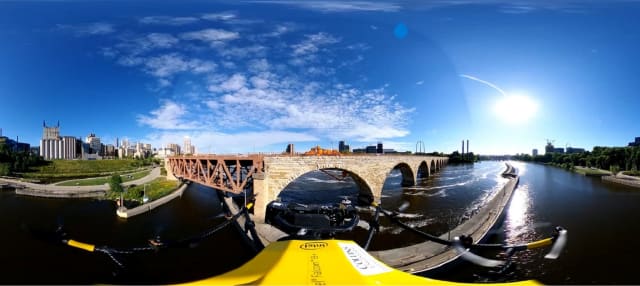 A UAV flies toward a stone bridge. (Picture courtesy of Bentley.)