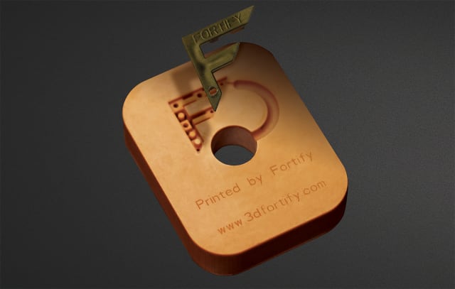 An injection mold tool filled with a proprietary ceramic additive along with a polypropylene part that came out of the tool. (Image courtesy of Fortify.)