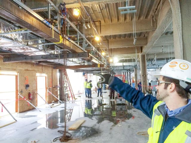 Onsite at Novartis, Skanksa received 600 assemblies from various shops and sequences onto the floors and merged into the above ceiling infrastructure. (Image courtesy of Skanska.)