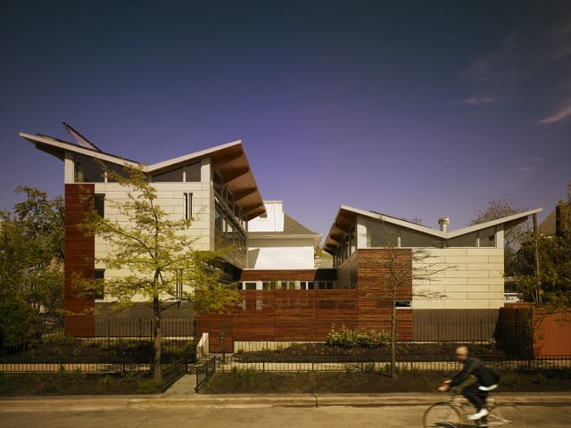 V-shaped butterfly roofs help to collect rainwater, which is directed to an underground cistern for use in irrigation. (Image courtesy of Farr Associates.)