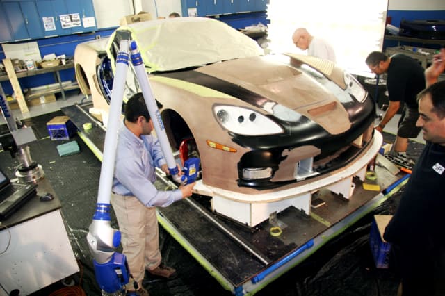 Pratt & MIller digitizing the body of a Chevrolet Corvette. A FARO Platinum Arm equipped with a FARO Laser Line Probe collects data at a rate of up to 19,200 points per second. (Picture courtesy of InnovMetric.)