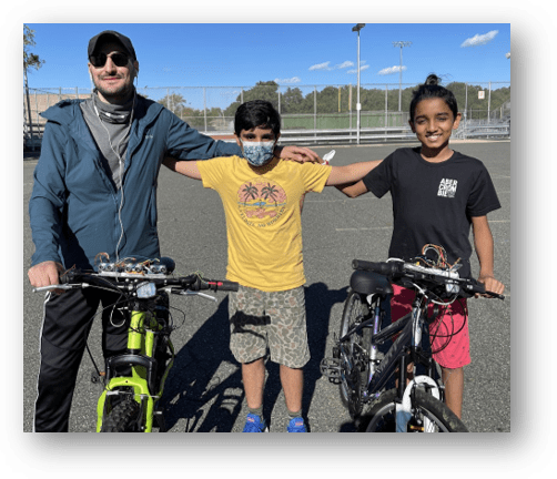 New York-based blind athlete, Eris Skenderi, tested Sehgal and Patel’s bicycle-to-bicycle system and gave it the thumbs up. (Image courtesy of Ansh Sehgal and Avi Patel.)