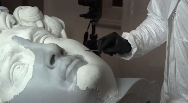 An art restorer applies a paste containing resin and Carrara marble. This type of marble has been used to create statues since antiquity. Other famous structures made from Carrara marble include the Pantheon and the Column of Marcus Aurelius. (Image courtesy of Hexagon.)