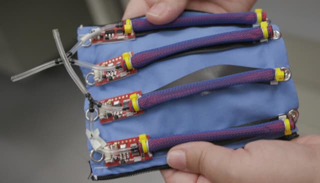Sensors and actuators on a rubber sheet make up the robotic skin being developed at Yale University. (Image courtesy of Yale University.)